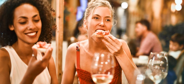Two women eating in the restaurant