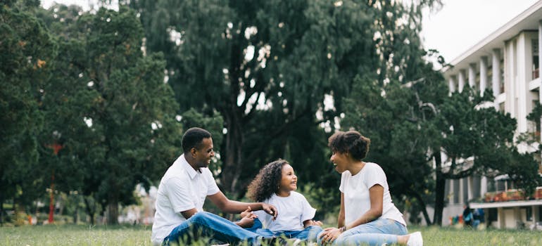 Family in the park in one of the safest neighborhoods in Toronto