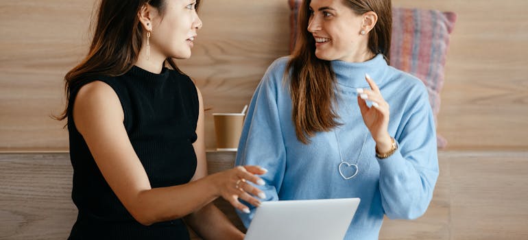 Two businesswomen with the laptop