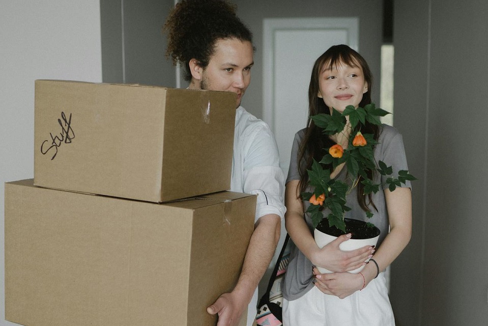 a couple moving into a new home