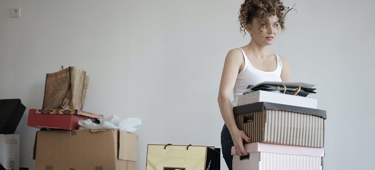 a girl in need of tips for decluttering your home before moving from Toronto to Edmonton