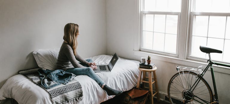 A woman sitting on the bed