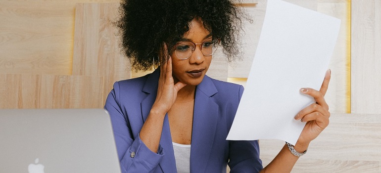 a curly girl learning how Canadians can secure California professional license
