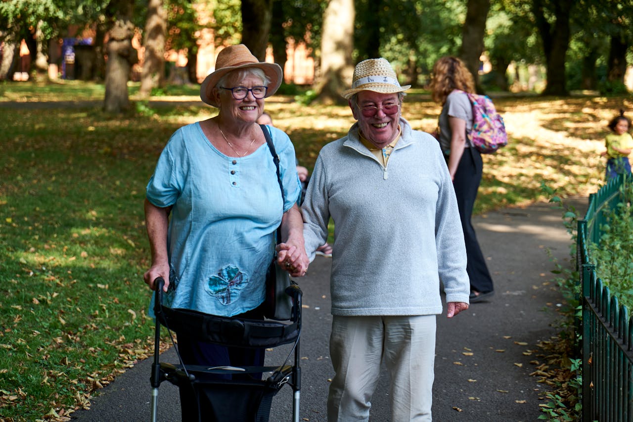 A couple in the park talking about retiring in Canada vs California