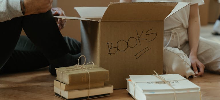 Two people unpacking
