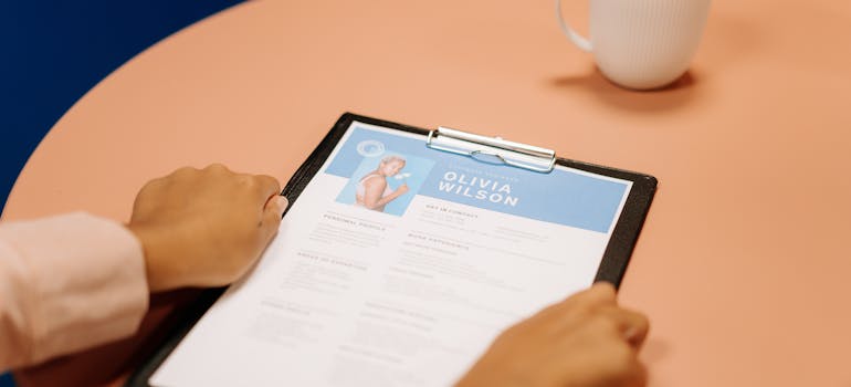 A person holding a resume