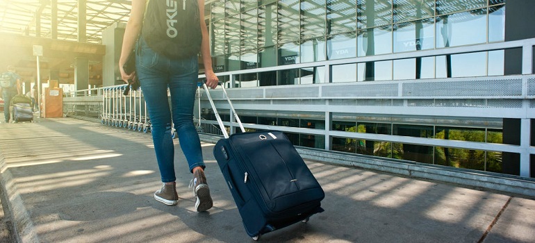 a woman with a suitcase