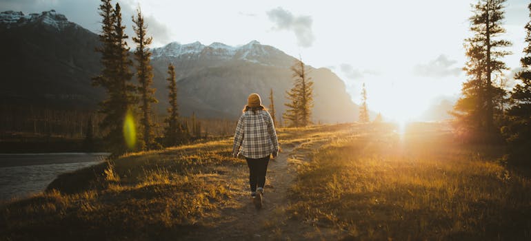 A woman walking and exploring Canadian provinces