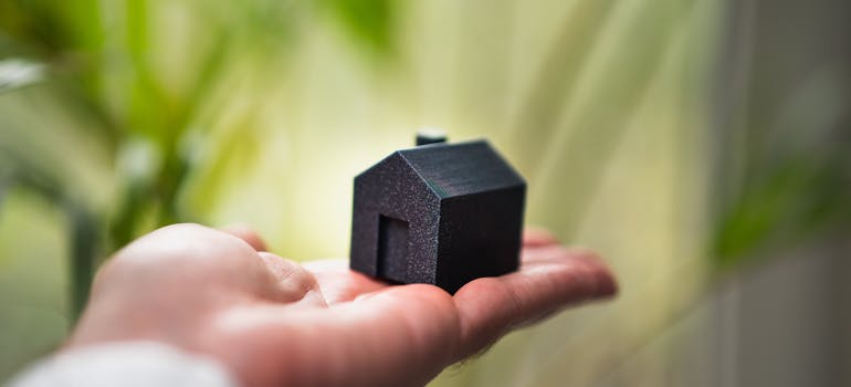 A model house on the hand