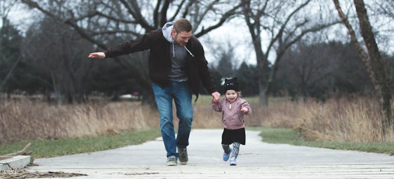 A father and a kid in the park