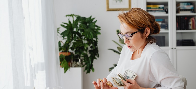 a woman trying to compare cost of living in Toronto vs. Montreal