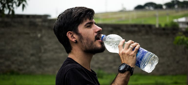 A man drinking water