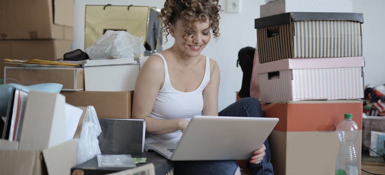 A woman saving money when relocating to Montreal bu decluttering her home