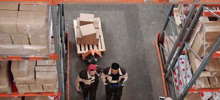 professional movers in a storage unit