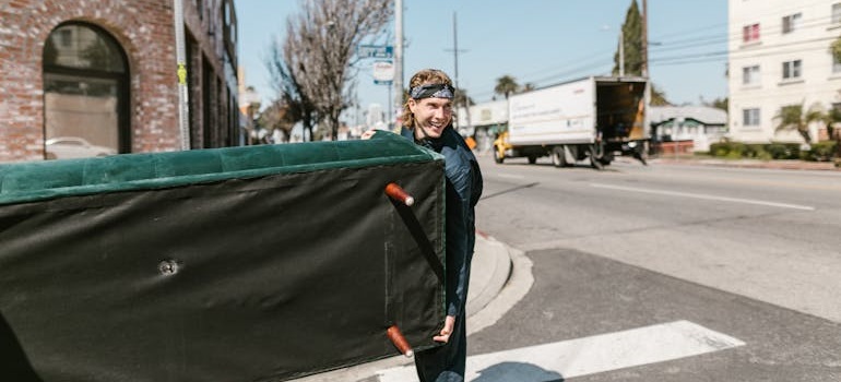 a mover carrying Things you should sell before moving to from Canada to California