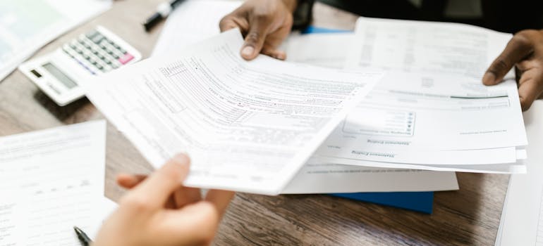 A person holding documents