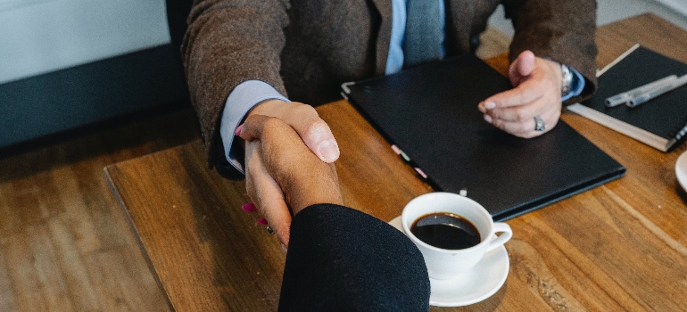 a handshake between two individuals