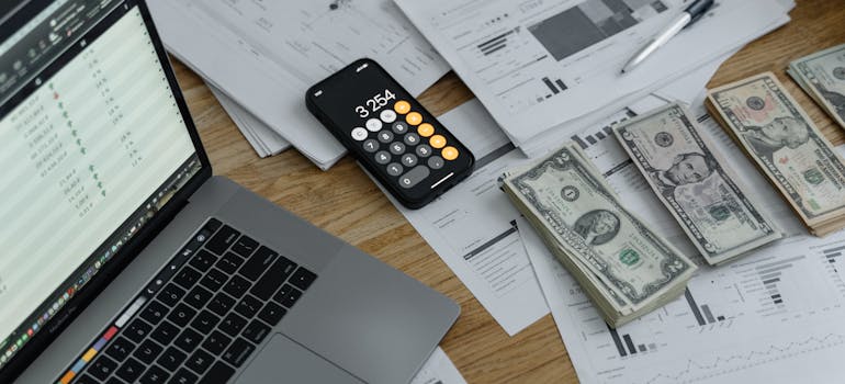 Dollar bills and calculator