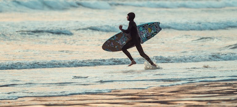 A person with the surfboard