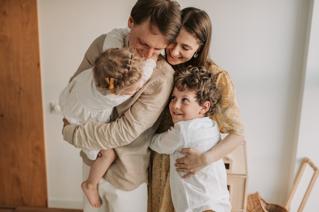 A happy family hugging